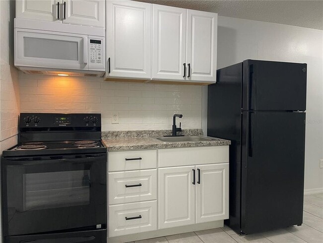 Building Photo - 1103 E 140th Ave