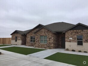 Building Photo - 9601 Iola Ave