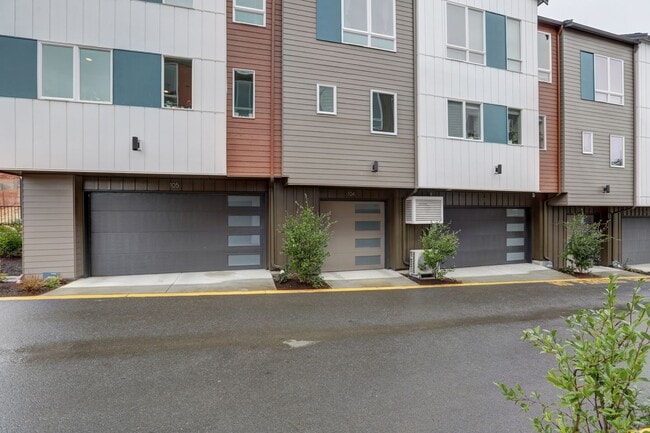 Building Photo - Live Where Style Meets Convenience – 2BR Townhome + Garage