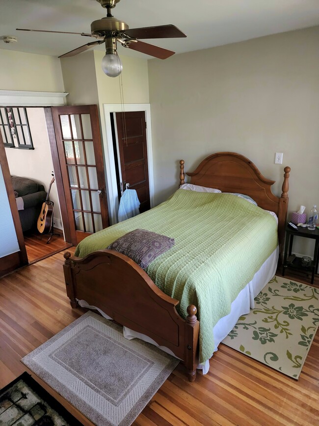 Large primary bedroom, plenty of natural light - 86 Woods Ave