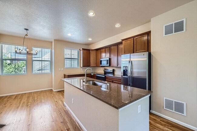 Building Photo - Evolve Real Estate: Available Immediately!...