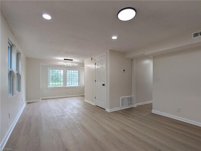 Building Photo - A Fresh Start on a Quiet Street – Everything New and Waiting for You!