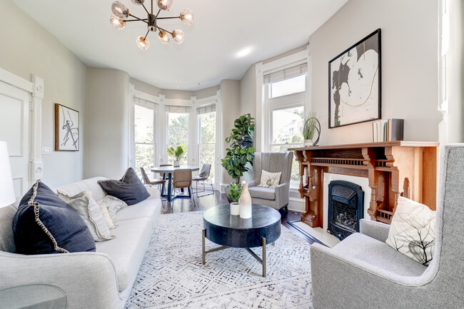 Elegant Living Room with bay window & gas fireplace! - 1302 R St NW