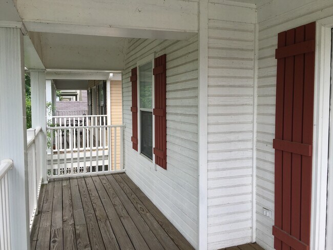 Building Photo - RARE HUGE fenced yard. Pets are allowed.