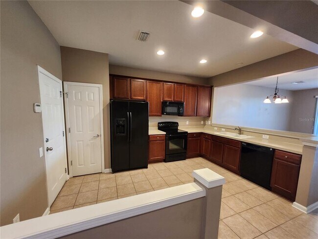 Building Photo - 10130 Pink Palmata Ct