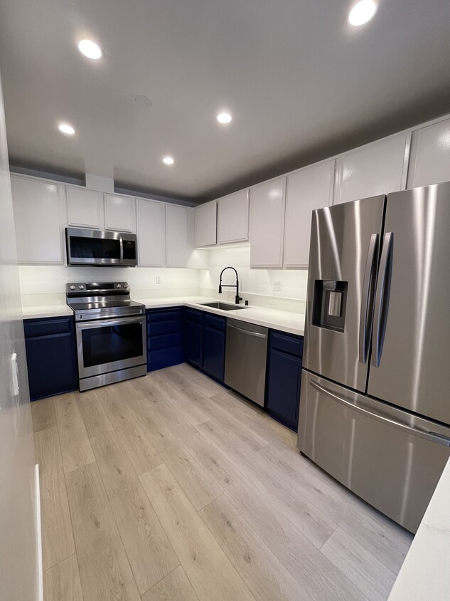 A typical 2 bedroom kitchen - 740 N Orlando