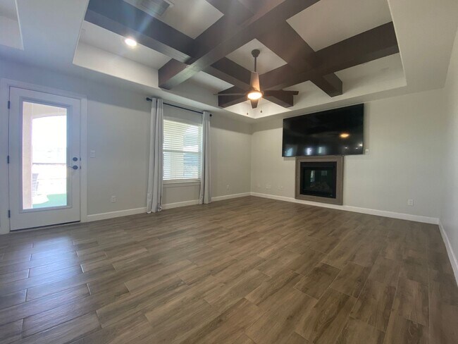 Foto del edificio - East El Paso 4 bed 2 bath Refrig A/C with gorgeous landscaping!