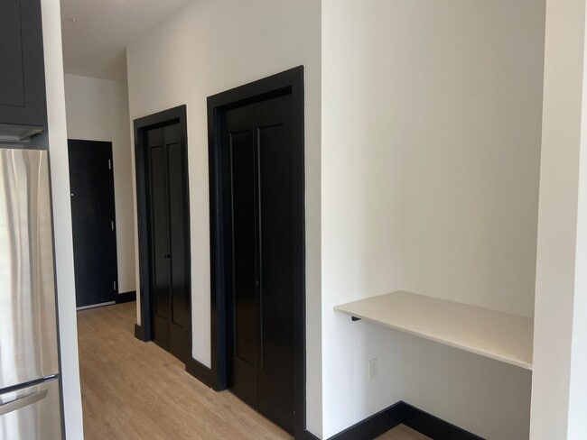 Building Photo - Stylish Studio Apartment | Watermark, Down...