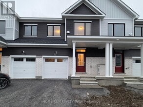 Building Photo - 381 Les Emmerson Dr