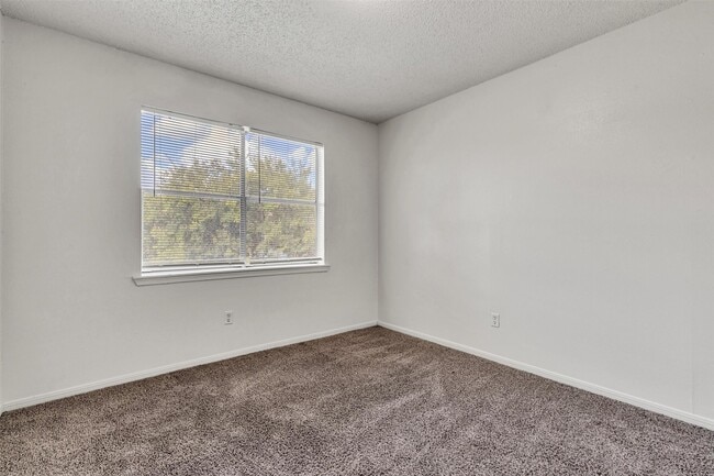 Building Photo - 7700 Creekbend Dr