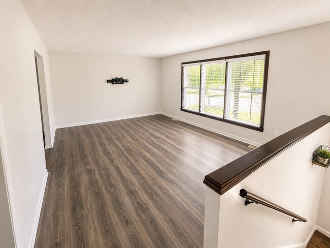 Building Photo - Spacious West Manhattan Home with Modern Updates, Oversized Garage & Prime Location