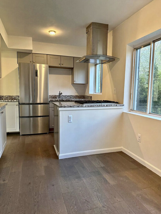 Kitchen and dining area - 9180 N Lilley Rd