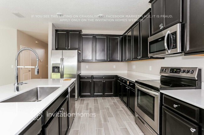 Foto del edificio - 9848 Lemon Grass Ln