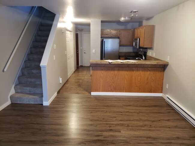 New hardwoods in living room & tile kitchen - 2824 E 32nd Ave