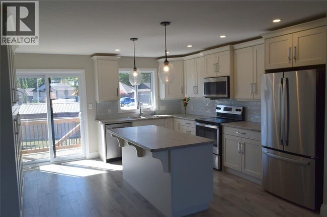 Building Photo - 305 Timtam Ct