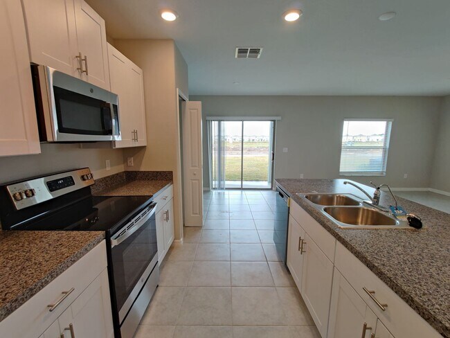 Building Photo - 7412 French Marigold Ave.