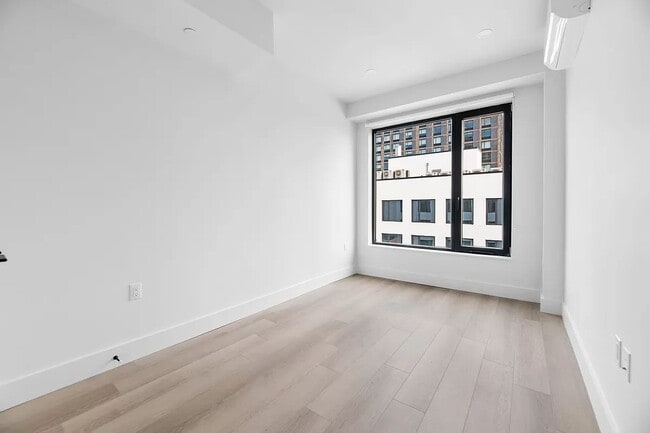 Building Photo - 215 East 124th Street