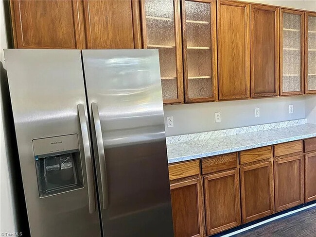 Building Photo - Earn Wealth While Leasing - Like a Homeown...