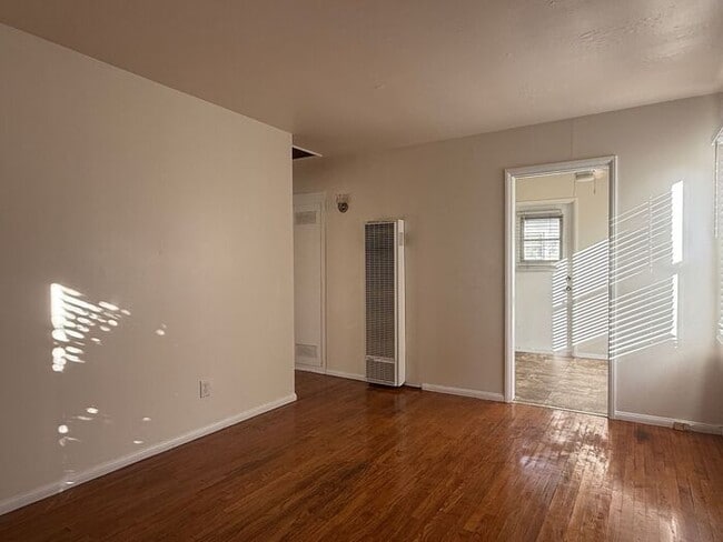 Building Photo - Renovated 1BR/1BA Cottage with Classic Character and Inviting Charm