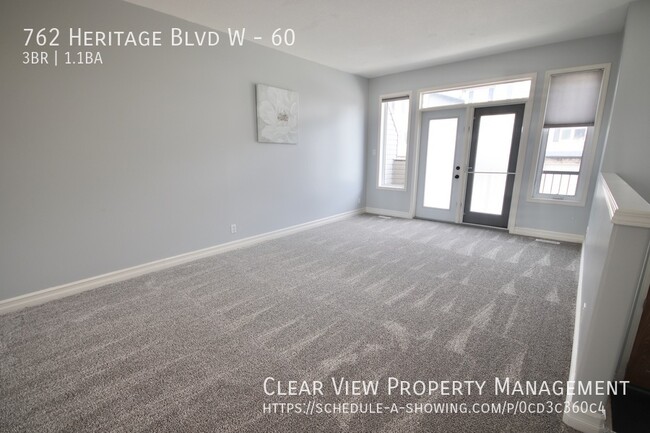 Building Photo - Beautiful 3 bedroom, 1.5 bathroom condo lo...