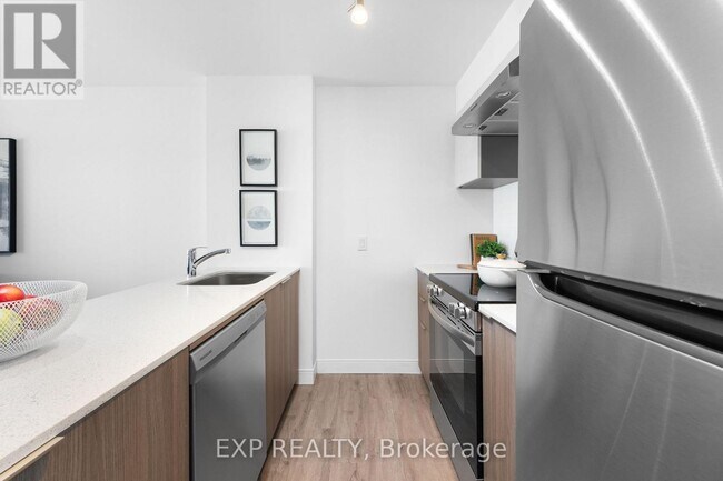 Building Photo - 100-100 Manett Crescent