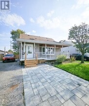 Building Photo - 33 Woodhouse Crescent