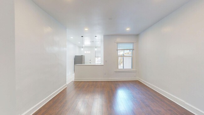 Building Photo - Four Bedroom 2,500 Square Foot House W/Back Patio, Multiple Kitchens/Laundry Facilities