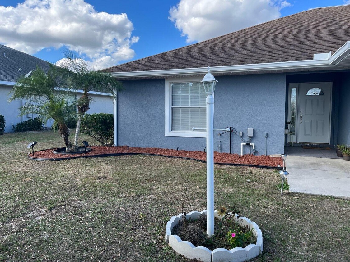 Front Yard of Duplex - 8253 Cozumel Ln