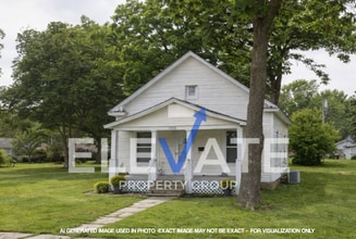 Building Photo - 1209 S Malcolm Ave