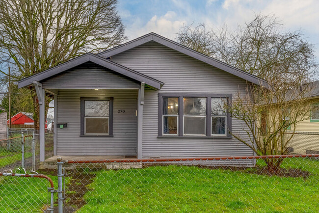 Building Photo - CUTE AND COZY TWO BEDROOM WITH GARAGE