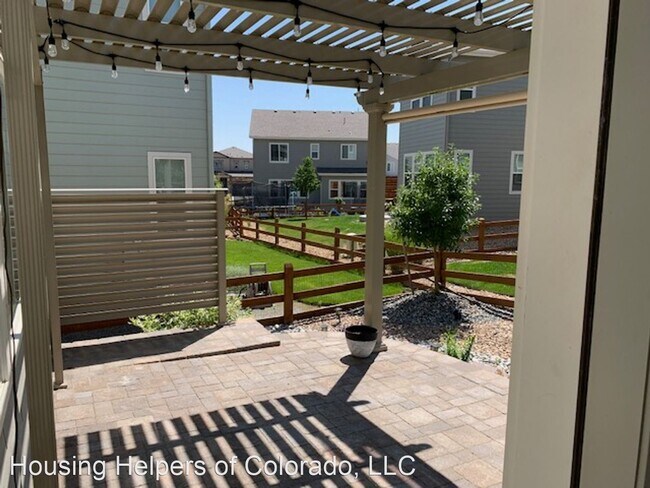 Building Photo - 3 br, 2.5 bath House - 15136 W 94th Avenue