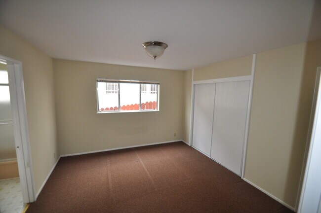 Large bedroom with closet and linen closet - 2445 8th Ave