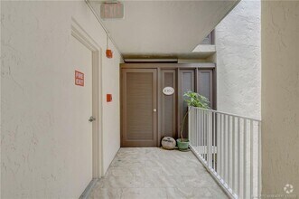 Building Photo - 8302 Marina Villa Dr