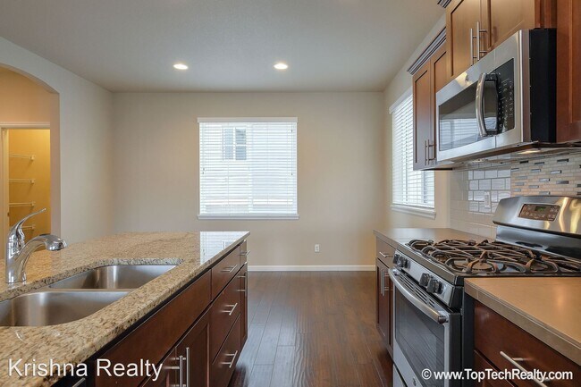 Foto del edificio - 3 br, 2.5 bath House - 7687 NW BUCKTHORN WAY