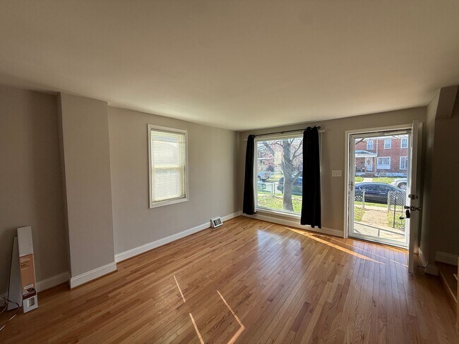 Building Photo - End Unit 3BR Townhome in Dundalk | Covered Porch, Fenced Yard, Central A/C + Off Street Parking