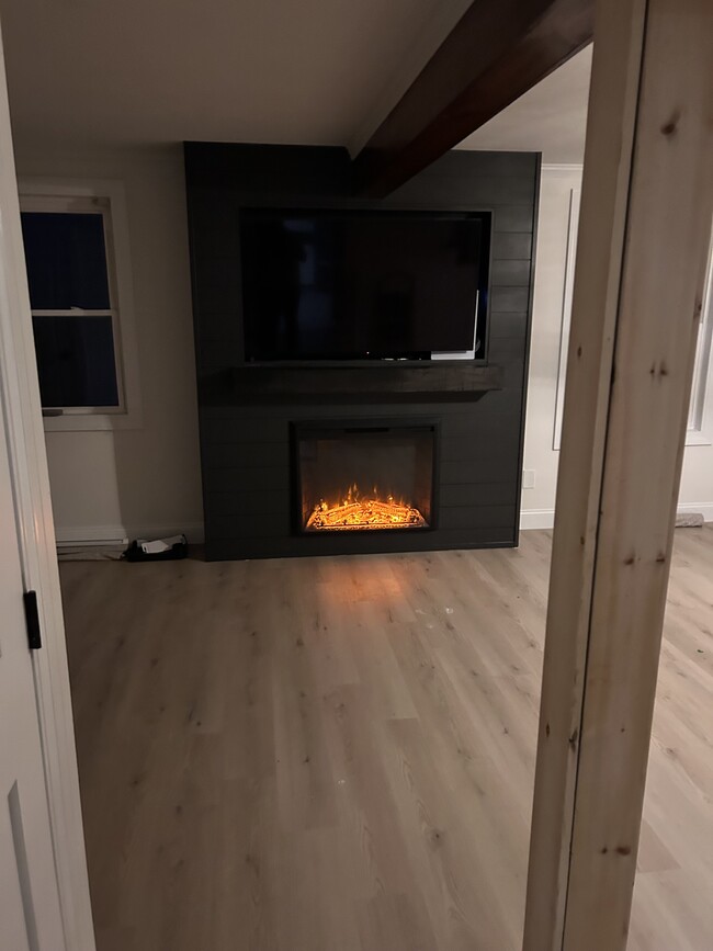 Living room with electric fireplace and built in tv stand - 146 Dolshire Dr