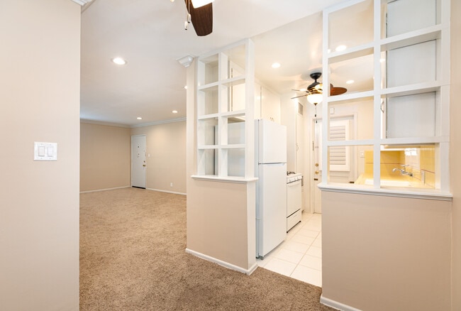 view looking at living room with front door in distance - 1317 19th St
