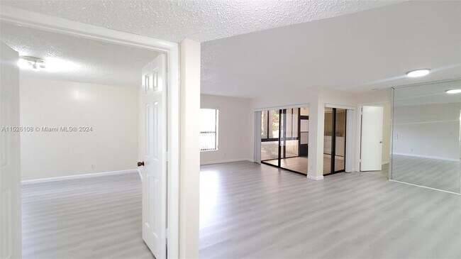 Building Photo - 3859 Cocoplum Cir