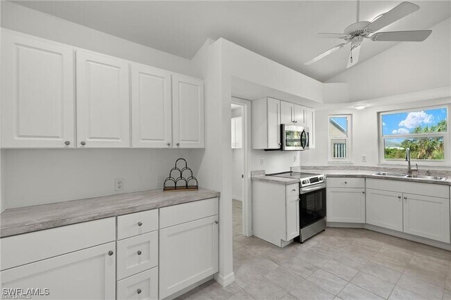 Building Photo - 16841 Sanibel Sunset Ct