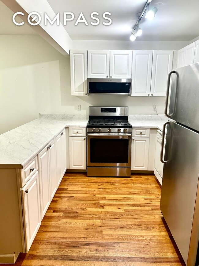 Building Photo - 710 St Nicholas Ave