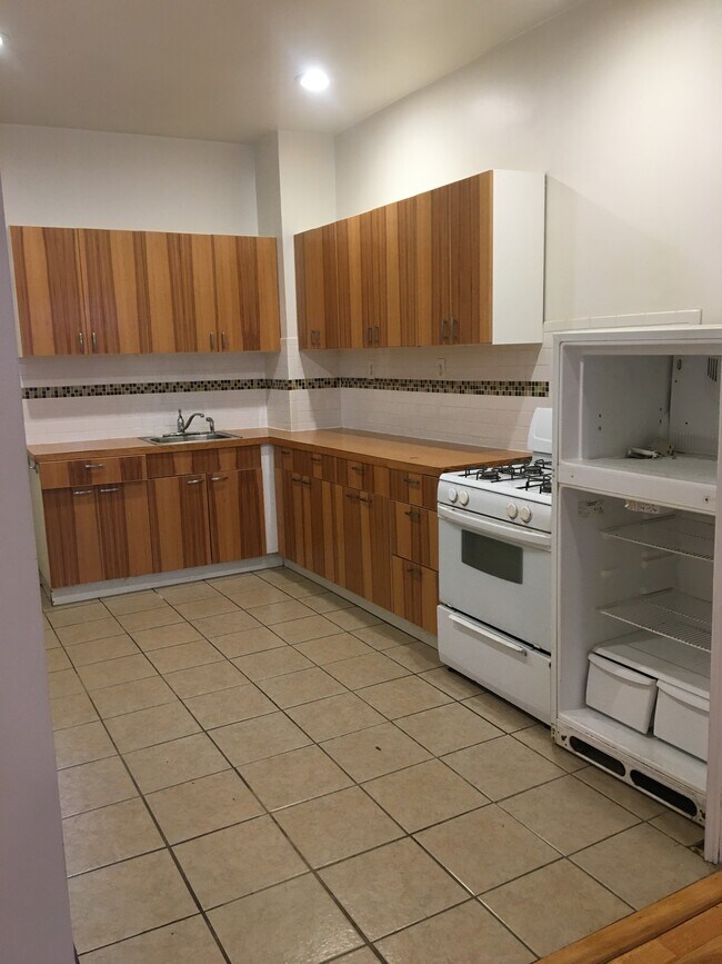 kitchen (new fridge coming Tuesday) - 3043 Amber St