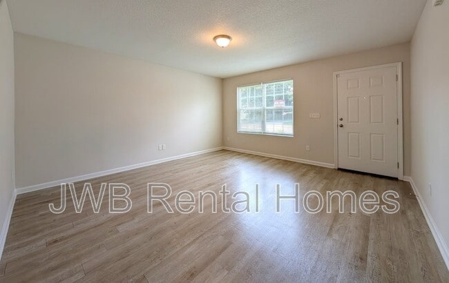 Building Photo - 8749 Dandy Ave