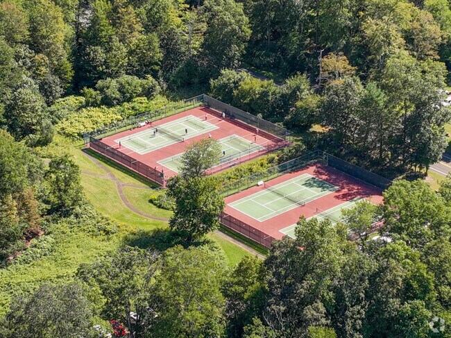 Residents enjoy tennis and pickleball at the public courts in Woodbridge.