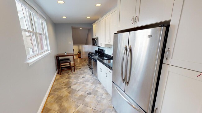 Building Photo - Room in 4 Bedroom Home at 24 S Washington St