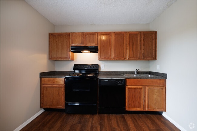 2BR, 1BA - 880SF - Kitchen - Amelia Apartments and Townhomes