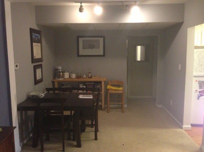 open dining area off kitchen and living room - 1909 N Rhodes St