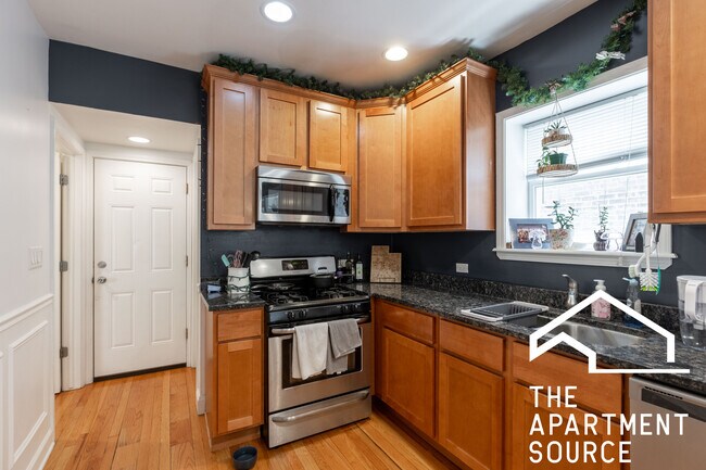 Building Photo - 4825 N Karlov Ave