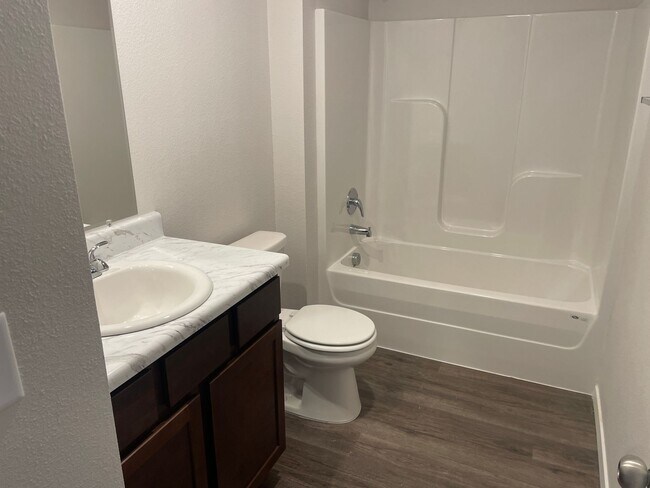 Building Photo - *New Year, New Home Special* BRAND NEW Thr...