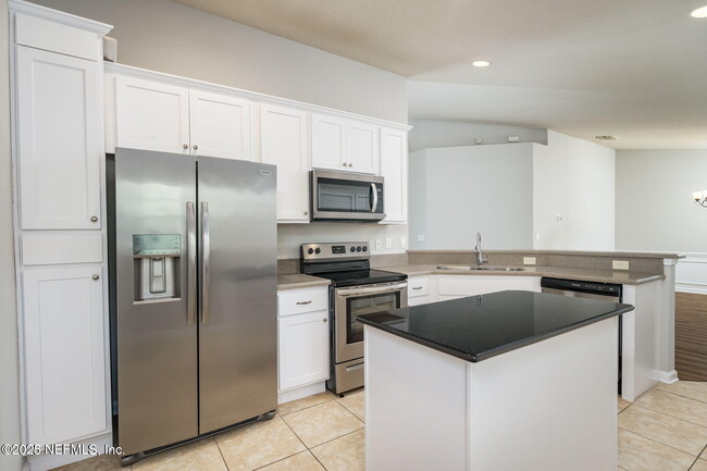 Building Photo - 6606 White Blossom Cir