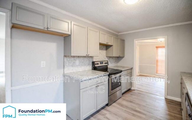 Foto del edificio - 411 Plum Point Pl